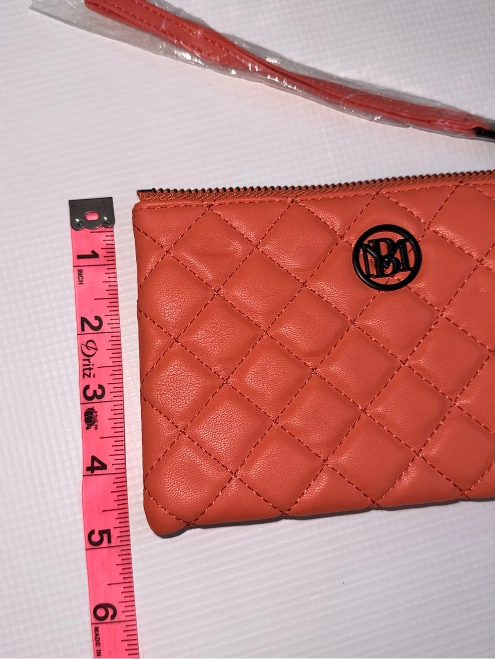 Badgley Mischka Quilted Coral Wristlet Clutch